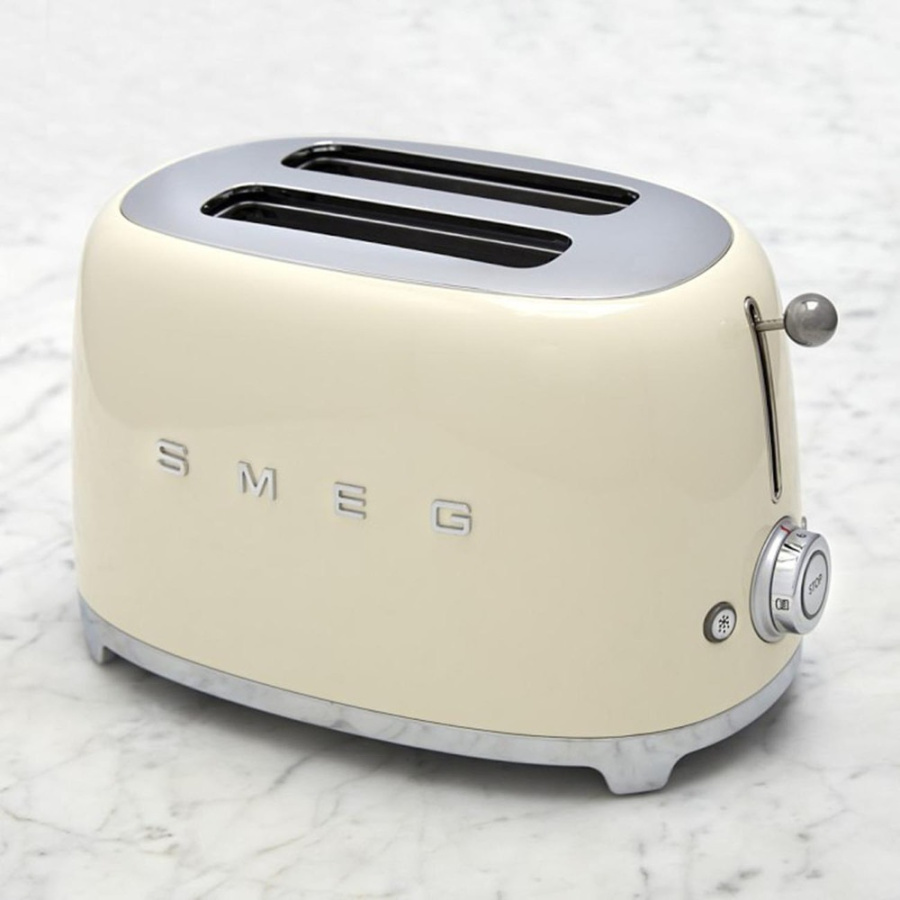 Тостер SMEG TSF01CREU кремовый глянцевый; подогрев, размораживание, багель; 6 уровней поджаривания; съемный поддон для крошек.